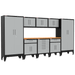 Armadillo Tough 9-Piece Heavy-Duty Steel Preconfigured Garage Cabinet Kit with Levelers and Casters grey from the front with drawers and a large sturdy workbench