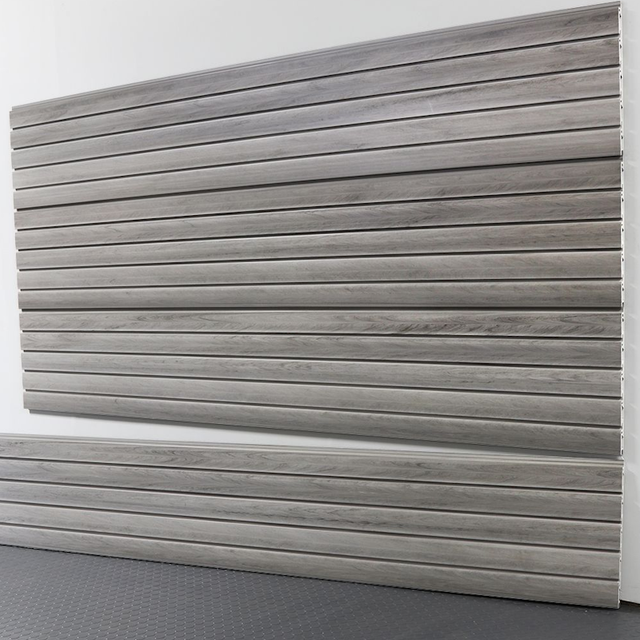 Garage slatwall 8 foot panel from the front with groves that can hold hooks, baskets and more