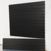 Black standard duty slatwall panels installed on a garage wall, showing sleek interlocking design and smooth matte finish by Oura Decor.