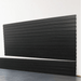 8-foot black slatwall panels installed on a garage wall, featuring durable interlocking channels and a sleek matte finish by Oura Decor.