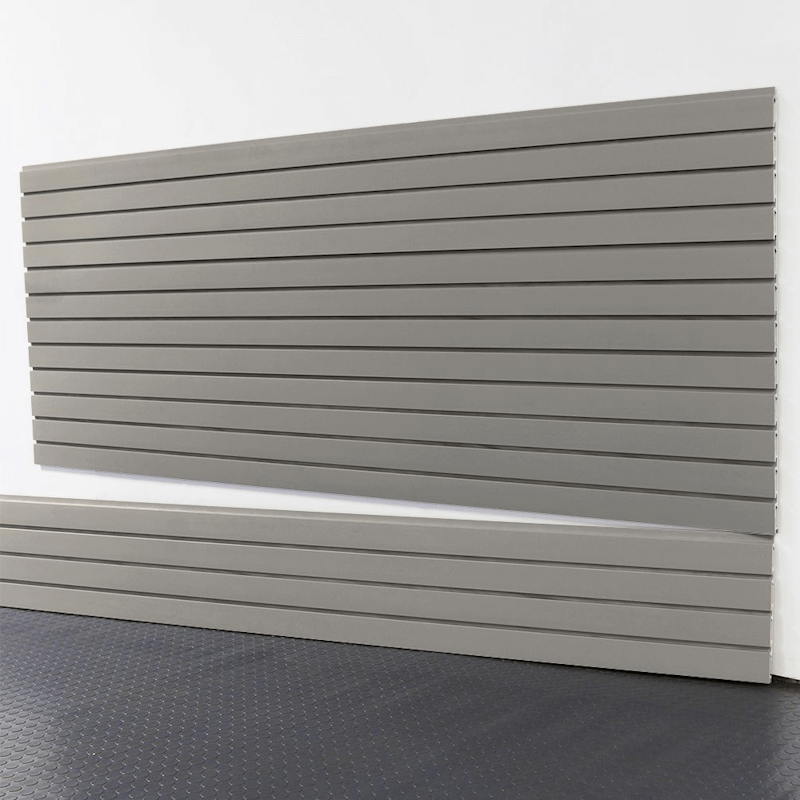 8-foot weathered grey slatwall panels installed on a garage wall, featuring a smooth modern finish and durable interlocking channels by Oura Decor.