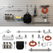 A wall-mounted utility organizer set shown installed on a gray slatwall above, with the same components displayed separately below on a white background. The set includes metal hooks, wire baskets, shelves, hose reel, power strip, spray bottles, a black bag, and other mounting hardware.