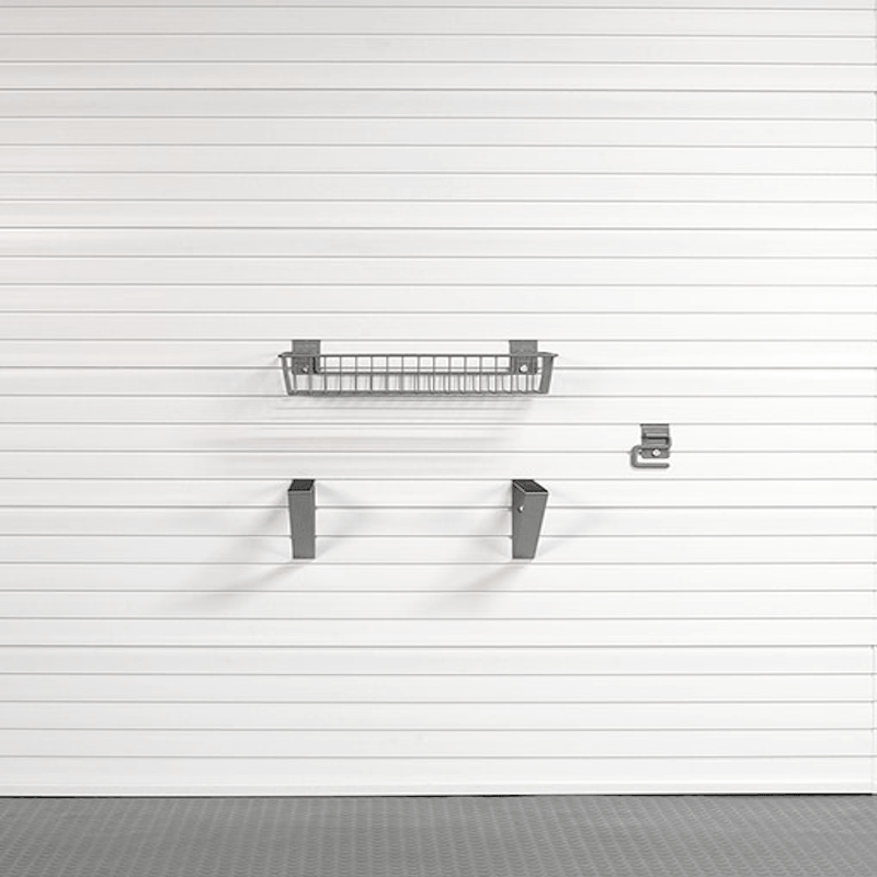 A gray metal garage door shelf and two matching wall brackets mounted on a white slatted garage door, with a gray floor visible at the bottom.