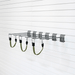 A wall-mounted metal rack with four horizontal bars and four green hanging straps, shown attached to a white slatwall.