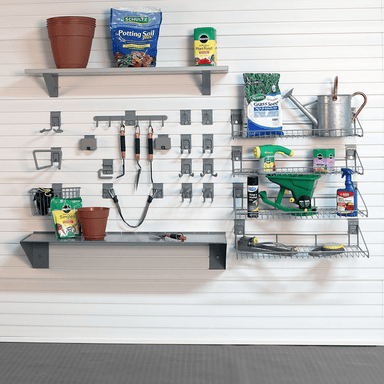 StoreWALL Heavy-Duty Lawn & Garden Slatwall System staged and from the front showing off wall storage and organization for lawn and garden items in a garage