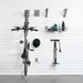 Basic storage display showing a single bike mounted on the wall with essential hooks for quick and easy access to cycling accessories.