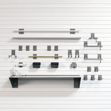 Deluxe Tool Storage Kit showing all components: integrated lighting, power strip, magnetic bar, tool brackets, and various shelving components.