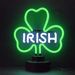 Neonetics Irish Shamrock neon sculpture featuring green and white hand-blown glass neon on a black base.