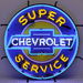 Neonetics Super Chevrolet Service neon sign with blue and yellow hand-blown glass neon over a full-color logo background.