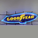 Neonetics Goodyear Blimp neon sign featuring blue and yellow hand-blown glass neon over a full-color logo.