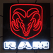 Neonetics RAM head logo neon sign with red hand-blown glass tubing and black metal grid support.