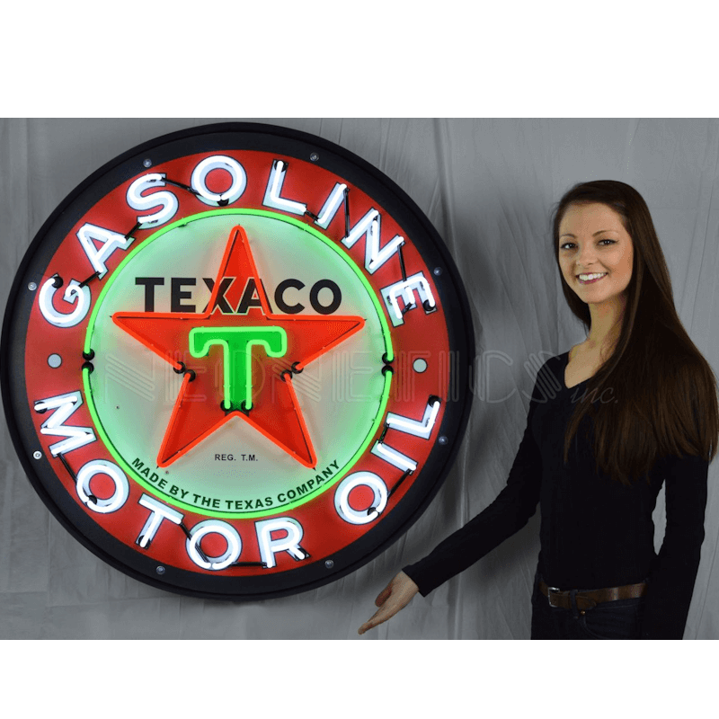 Large 3-foot Texaco Motor Oil neon sign shown with a person to demonstrate scale for garage wall decor.