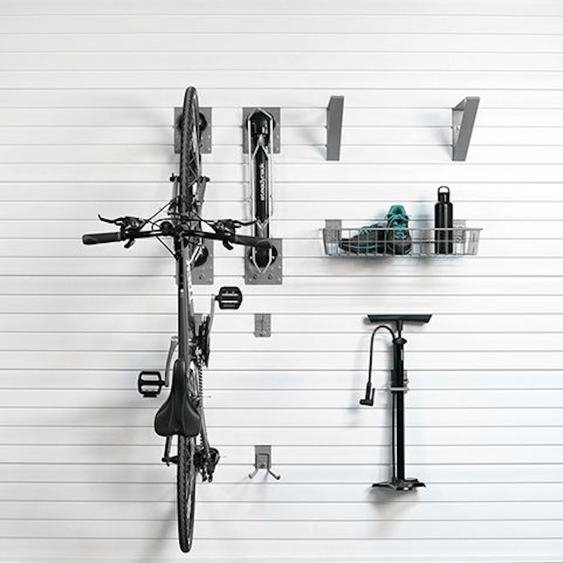 Bicycle mounted with the Premium Steadyrack system, focusing on the tidy, efficient storage of cycling shoes, helmets, and accessories.