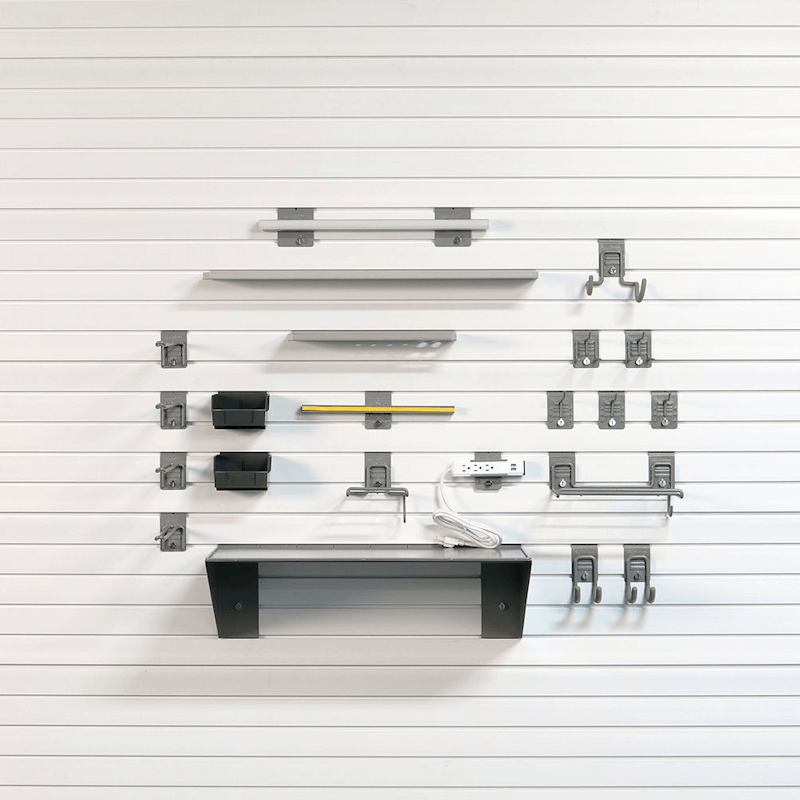 Premium Tool Storage Bundle accessory layout showcasing power strip, power tool brackets, tripod tool hooks, and ledge shelves.
