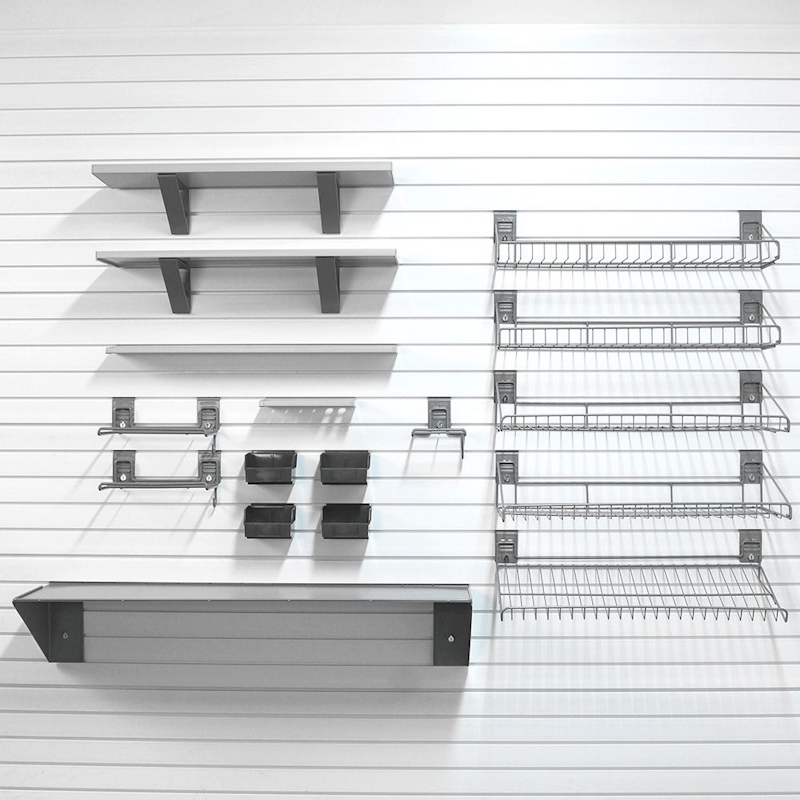 63lb Deluxe Shelf Bundle featuring multiple wood shelves, wire baskets, plastic ledges, and tool organizers installed on a white slatwall.